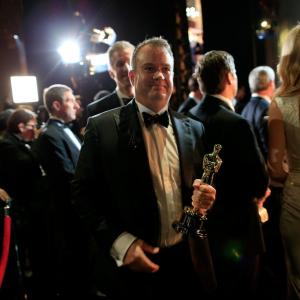 Neil Corbould, backstage at Academy Awards with Oscar for GRAVITY