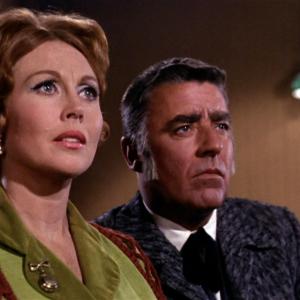 Still of Hazel Court and Peter Lawford in The Wild Wild West 1965