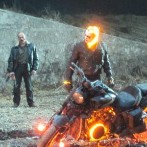 Still from 'Ghost Rider' Nick Cage getting hot under the collar! very cool bike though.