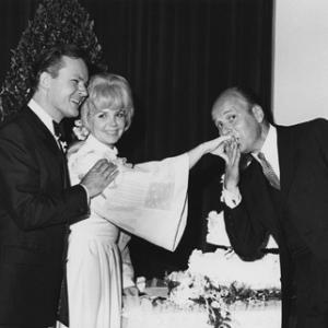 Bob Crane during the wedding to his second wife Sigrid Valdis on the set of Hogans Heroes Werner Klemperer kissing brides hand
