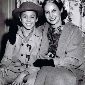 Betty Crawford with her son Johnny while he was appearing with Chuck Connors at the Annual AkSarBen Rodeo in Omaha Nebraska 1959