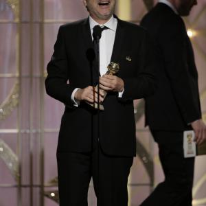 Alfonso Cuarón at event of 71st Golden Globe Awards (2014)