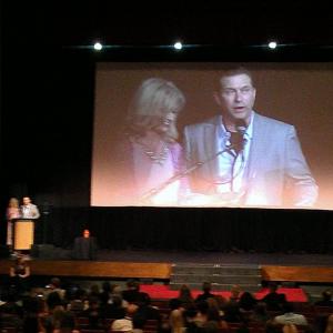 Sabrina Culver and Stephen Baldwin presenting the awards for best cinematographer and best editor at the 168 Film Festival
