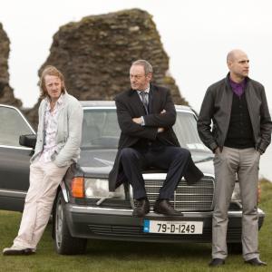 Still of Liam Cunningham, Mark Strong and David Wilmot in The Guard (2011)