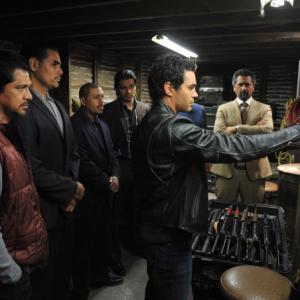 Still of Cliff Curtis and Ramon Rodriguez in Gang Related (2014)