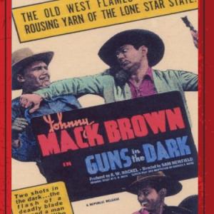 Johnny Mack Brown Dick Curtis and Claire Rochelle in Guns in the Dark 1937