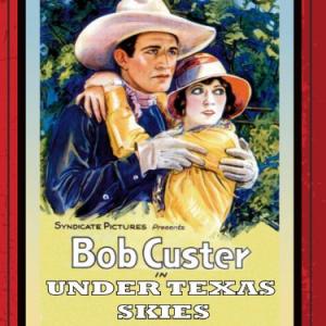 Bob Custer and Natalie Kingston in Under Texas Skies (1930)