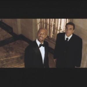 From left to right singerActor Common as Scott McKnight and actor Richard DAlessandro as his chauffeur  in Just Wright