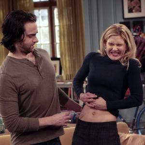 Still of Chris DElia and Rhea Seehorn in Whitney 2011