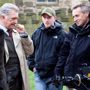 Nick Dance right shooting George Gently for BBC TV with Martin Shaw left and Director Daniel OHara centre
