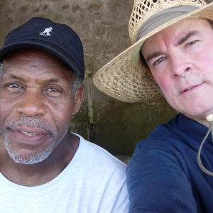 John F. Davis with Danny Glover on Isla de Mozambique while scouting 