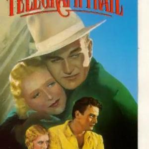 John Wayne and Marceline Day in The Telegraph Trail 1933