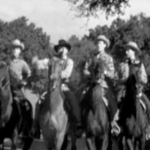 Eddie Dean, Eddie Dew and John James in West of Cimarron (1941)