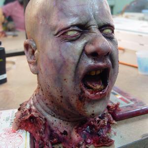 Bite Me season 2 severed zombie head