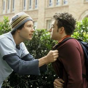 Adam Michael Rosenbaum left tries to reason with his fraternity little brother Jimmy Tony Denman right