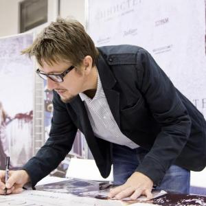 Signing Sinister posters in Moscow Russia