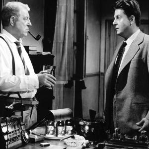 Still of Jean Desailly and Jean Gabin in Maigret tend un piegravege 1958