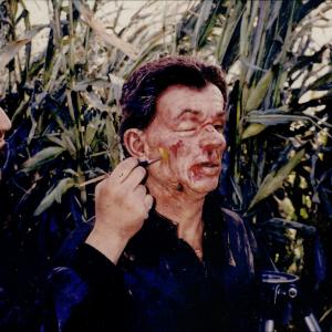 Ken Diaz applies final color adjustments to the Bat Beating prosthetic makeup on Phillip Suriano as Dominick Santoro on the set of Casino