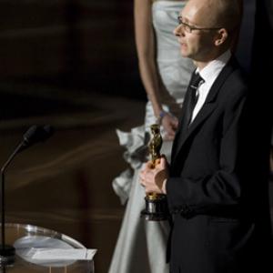 Accepting the Oscar® for Achievement in film editing, for 