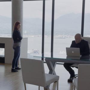 Still of Hugh Dillon and Magda Apanowicz in Continuum (2012)