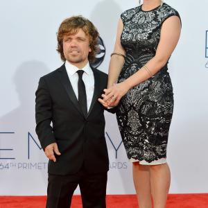 Peter Dinklage and Erica Schmidt at event of The 64th Primetime Emmy Awards (2012)
