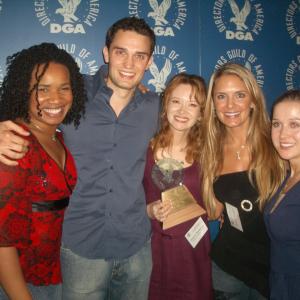 Sunny Doench with Stacey Kattman Director and the cast receiving the DGA Grand Prize Award