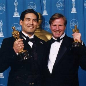 Chris Tashima director and Chris Donahue producer at the 70th Annual Academy Awards  Live Action Short Film winners for Visas and Virtue  March 23 1998