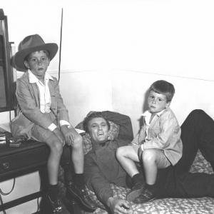 Kirk Douglas with his sons Michael and Joel on the set of 