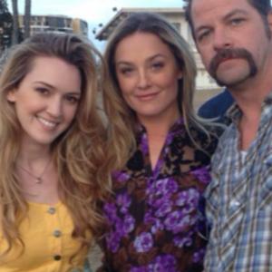 The Rivers family Kayla Carlyle as Skye Rivers Elisabeth Rohm as Grace Rivers Tom Downey as Jake Rivers on set of Rivers 9 Marina Del Rey CA 2013