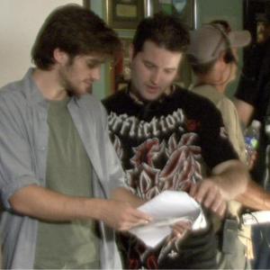 Jeffrey Adler and Danny Draven discussing a scene on the set of REEL EVIL
