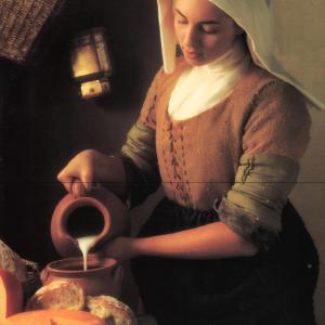 Ellen in an award winning photo duplicating Vermeers THE MILKMAID for a Holland Cheese ad