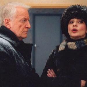 Still of André Dussollier and Laura Morante in Coeurs (2006)
