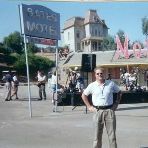Jim Dykes at Universal Studios Hollywood on PSYCHO set specially recreated for E! Shoot Notice Bates Motel and spooky house behind me Note Wisteria Lane from Desperate Housewives is located to my right