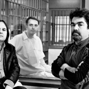 Filmmakers Joe Berlinger (right) and Bruce Sinofsky (left) with West Memphis Three member Damien Echols on death row in 2009 during the filming of Paradise Lost 3: Purgatory.
