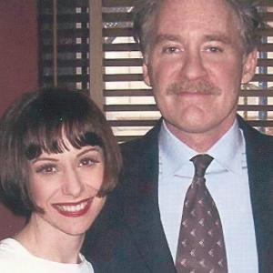 Susan photographed with Kevin Kline at Sardis in NYC 2004