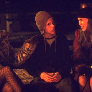 Sophie (Jennifer Beals, left) and Andrea (Elizabeth Berkley, right) give Nick (Jesse Eisenberg) an experience he'll never forget