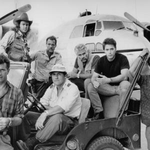 Still of Mel Gibson, Robert Downey Jr., Marshall Bell, Ned Eisenberg, Art LaFleur and Tim Thomerson in Air America (1990)