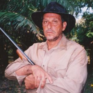 Murilo Elbas as Hunter of animals in Bicho do Mato