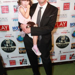 John Wellington Ennis and his little girl at the Westwood premiere of PAY 2 PLAY.