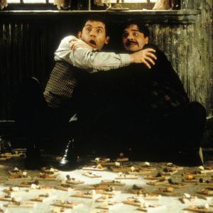 Still of Nathan Lane and Lee Evans in Mousehunt 1997
