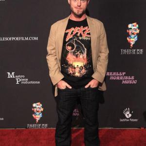 Trevor Eyster at the Grauman's Egyptian Theater for the World Premiere of 'Tales of Poe' 20 August 2014.