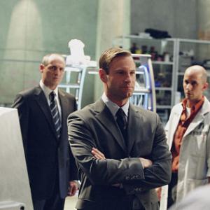 Still of Aaron Eckhart Colm Feore and Christopher Kennedy in Paycheck 2003