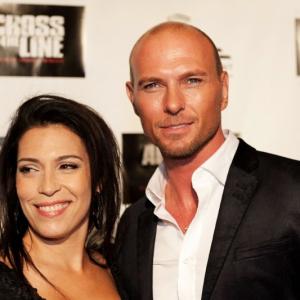 Claudia Ferri and Luke Goss at the Hollywood Premiere of Across the line The Exodus of Charlie Wright