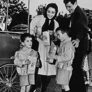 Elizabeth Taylor with fourth husband Eddie Fisher and sons Christopher and Michael Wilding Jr C 1960