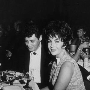 Eddie Fisher, Elizabeth Taylor and Danny Thomas at a party thrown by Eddie Fisher at the Coconut Grove C. 1960