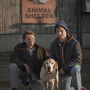 Still of Noel Fisher and Bruce Greenwood in A Dog Named Christmas (2009)