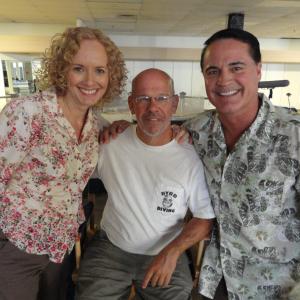 On the set of Dolphin Tale are actors Kim Ostrenko and Jim Fitzpatrick with their Director Charlie Smith seated