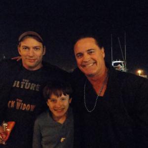 Attending the wrap party for Dolphin Tale in 2011 are actors LR Harry Connick Nathan Gamble and Jim Fitzpatrick