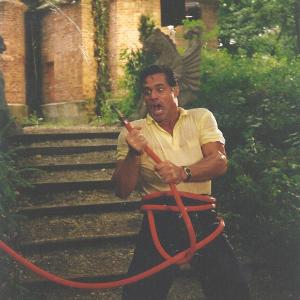In Transylvania Romania actor Jim Fitzpatrick Starring as Tony wrestles with a possessedhose in the childrens film The Little Ghost in 1996