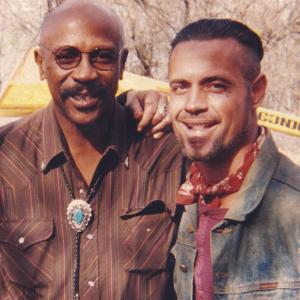 On the set of Curse of the Starving Class in Dallas Texas actors Lou Gossett Jr and Jim Fitzpatrick Publicity photo in 1993